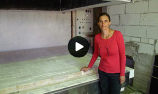 Alena Matějka melts flying carpets of glass in a huge electric
            furnace